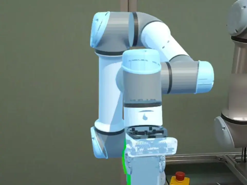 The hologram of a robot arm drawn in the real room, seen through a headset